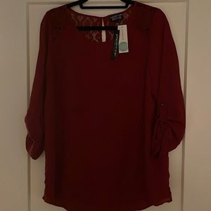 Dark red blouse with lace detail